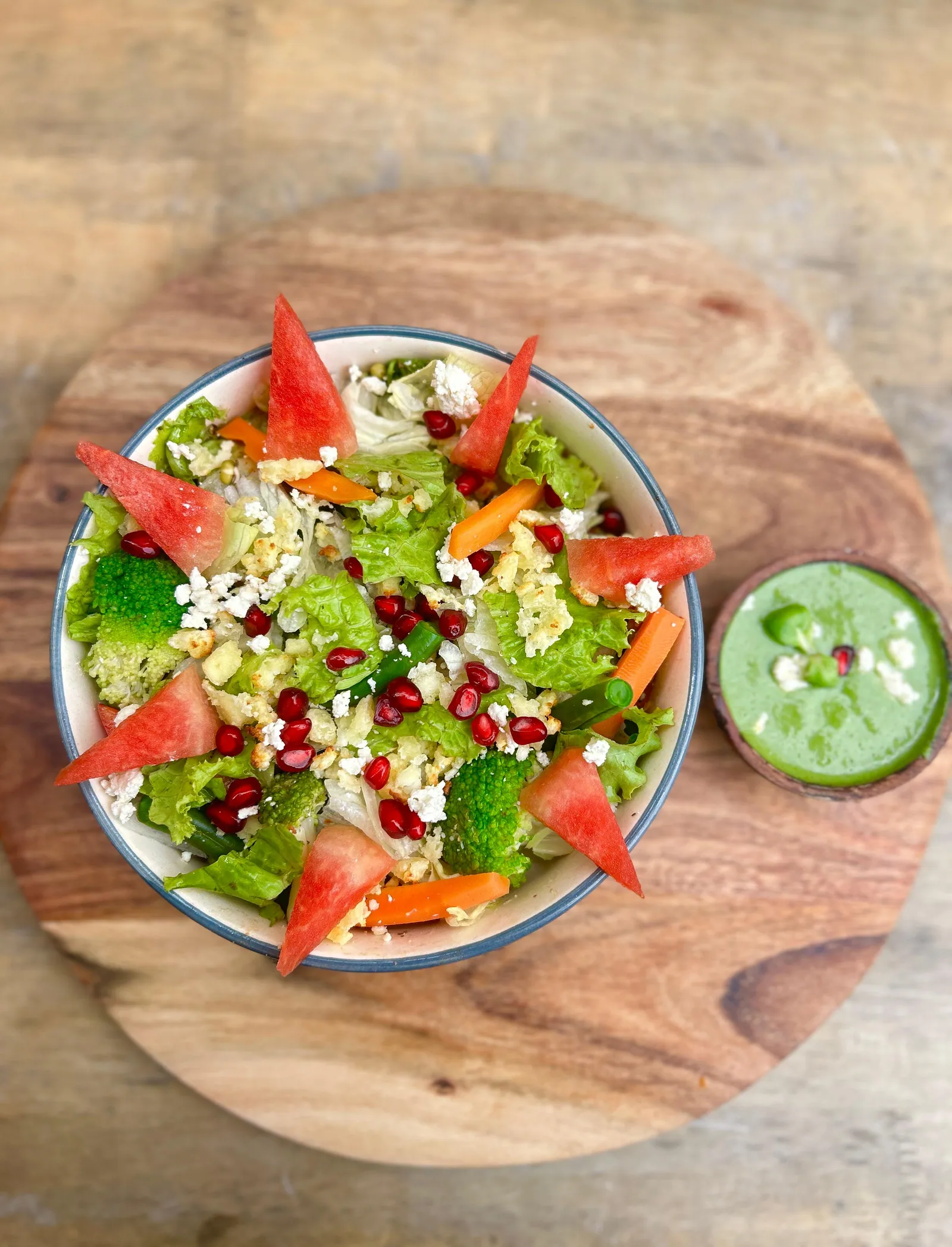 Fresh salad bowl with greens