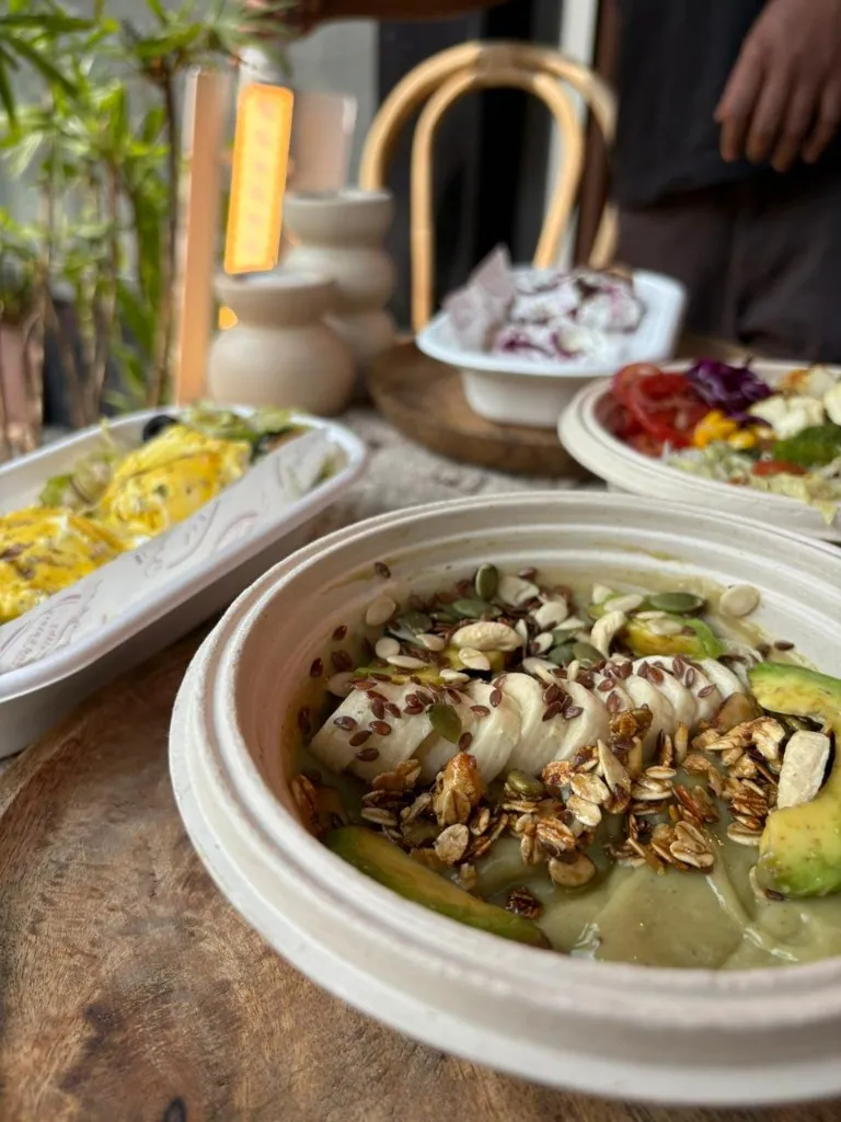 The day's plated bowls lined up and ready for delivery from Clean & Green